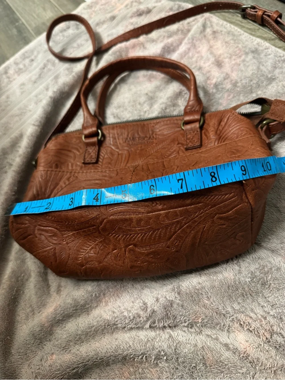 American Leather Co. compact embossed